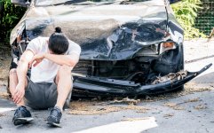 desperate-man-crying-old-damaged-car-after-crash-accident.jpg