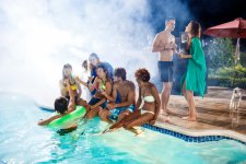 young-friends-smiling-rejoicing-resting-party-near-swimming-pool.jpg