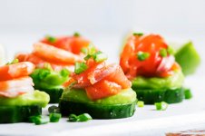 appetizer-with-cucumber-avocado-salty-trout-shrimp-white-background-selective-focus.jpg